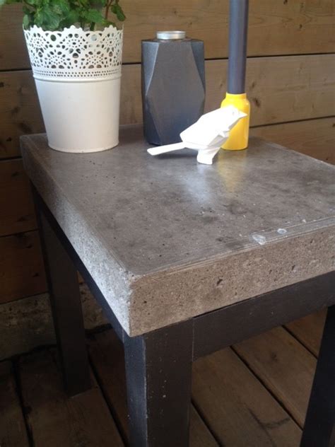 Legendary designer and antiques dealer axel vervoordt created an informal coffee table with concrete blocks and a slab of wood in this belgian interior. DIY Concrete Side Table - Storefront Life
