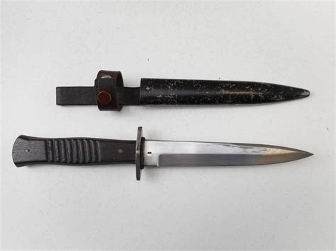 Wwii German Trench Knife With Scabbard Switzers Auction And Appraisal