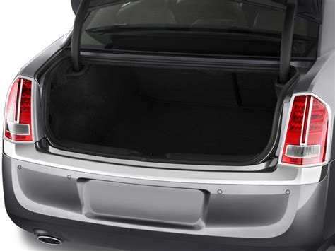 That best in class trunk space is also accessible from the back seat. Image: 2011 Chrysler 300 4-door Sedan 300C RWD Trunk, size ...