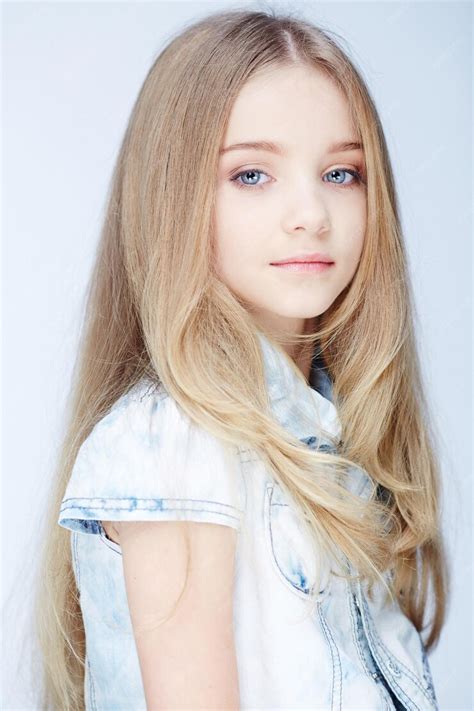 Free Photo Portrait Of Young Blond Girl With Blue Eyes