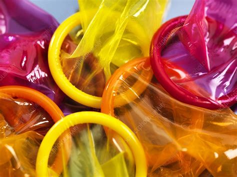 coloured condoms stock image f008 3175 science photo library