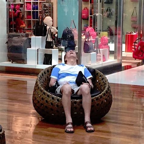 Hilarious Photos Of Miserable Men Waiting For The Shopping Trip To Be