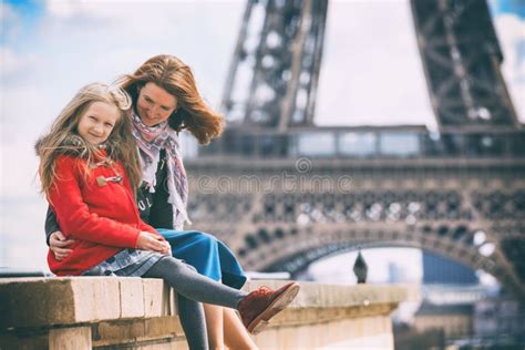 Mom And Daughter On The Background Of The Eiffel Tower Stock Image