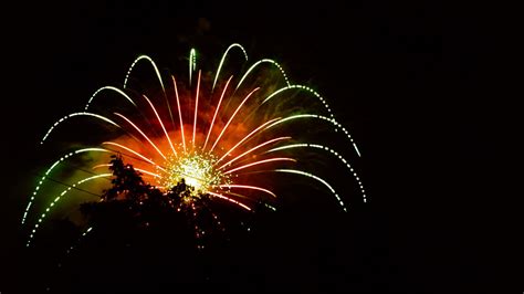 Download Wallpaper 1366x768 Fireworks Explosion Flash Night Dark