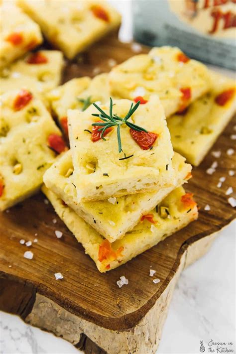 The name focaccia is derived from the roman panis focacius, which means hearth bread indicating that it was originally baked in coals back in roman times. Gluten Free Focaccia Bread with Garlic, Rosemary and Tomatoes | Gluten free focaccia, Gluten ...