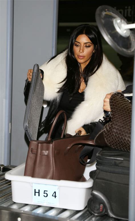 Good photos will be added to photogallery. Kim Kardashian Street Style - at LAX Airport in Los ...