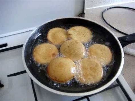 After you've mashed your banana (the riper the sweeter), mix the flour, sugar bicarbonate of soda, and salt together, and add it slowly to the banana until you have a dough. How to make kabalagala - YouTube