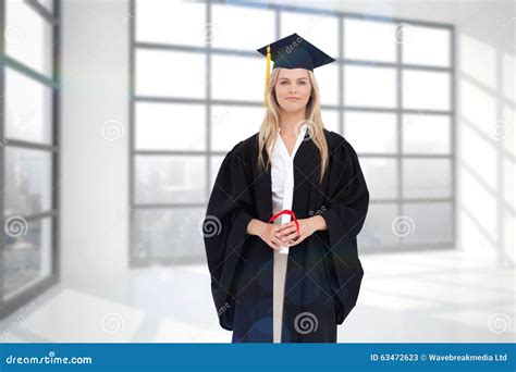 Composite Image Of Blonde Student In Graduate Robe Stock Image Image