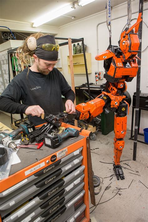 A Practical Orange Prototype Droid Under Construction At Weta Workshop