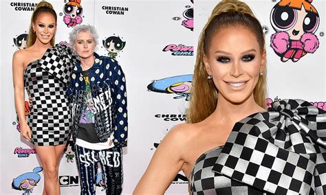 Gigi Gorgeous Sizzles In Metallic Dress With Wife Nats Getty At