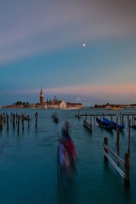 Venice Lagoon Gondola Moving Towards San Giorgio Island At Twilight