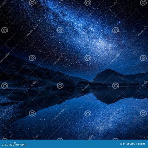 Milky Way And Stars Reflection In Lake District Lake England Stock