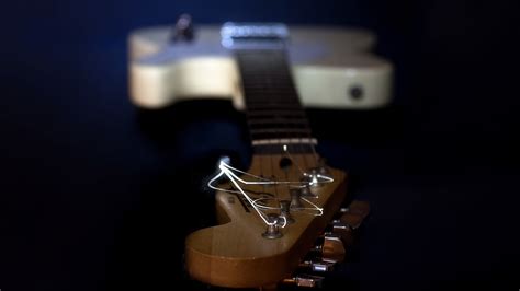 Selective Focus Photography Of Brown Guitar Headstock Hd Wallpaper