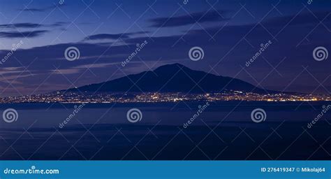 Panorama Of Mount Vesuvius At Night With City Lights Of Naples Italy