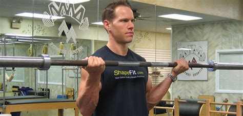 Wide Grip Barbell Curls - Biceps Exercise Guide with Photos