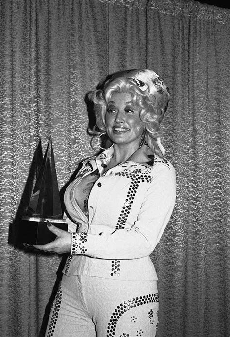 Country Singing Sensation Dolly Parton Had A Young Start In The Music Business Beginning Her