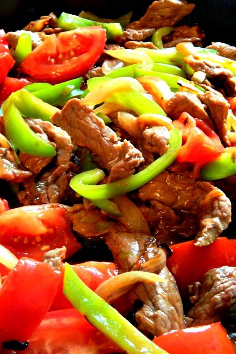 Serve over rice, rice noodles or in a. Green Pepper Steak with Tomatoes and Onions - Tiffanie ...