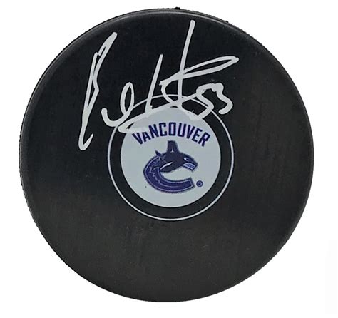 bo horvat autographed vancouver canucks logo puck house of hockey