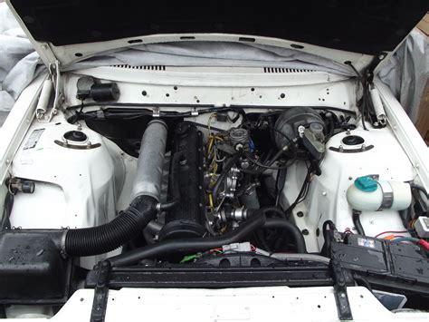 Filed24 Engine Bay Of A 1990 Volvo 240 Wikimedia Commons