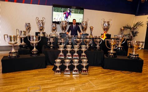 This Pic Of Lionel Messi Next To All The Trophies He Won Playing With