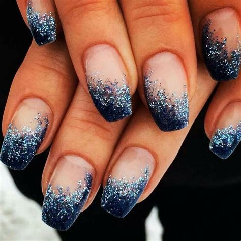 Light blue nails are one of the biggest 2021 nail trends. Image result for blue silver glitter gradient nail tips ...