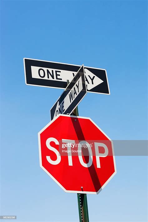 Stop Sign And One Way Signs High Res Stock Photo Getty Images