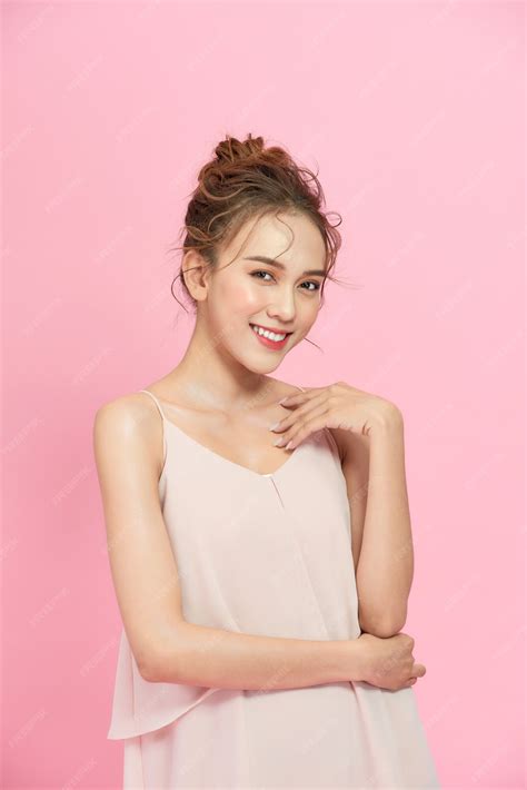 premium photo beautiful girl on a pink background
