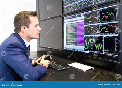Stock Broker Trading Online Talking On Mobile Phone Editorial Image
