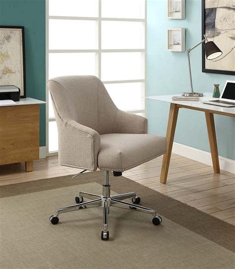 This desk chair in a neutral linen will go with any modern desk. 10 Stylish And Comfy Office Chairs - Chic Home Life