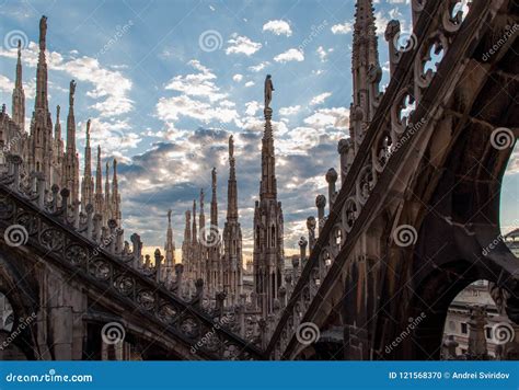 Roof Terrace Of Milan Cathedral Duomo With Its Spires And Sculptures