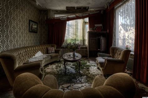 Abandoned Mansion Features Upholstered Furniture Pictures Still Hanging On Walls Photos