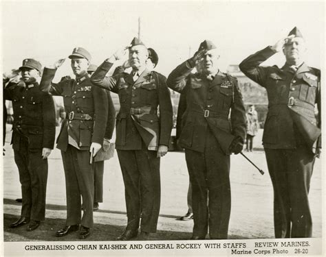 Chinese Generalissimo Chiang And Us Major General Rockey Saluting