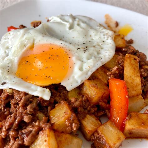 Beef And Nduja Hash Topped With A Fried Egg Just The Right Side Of