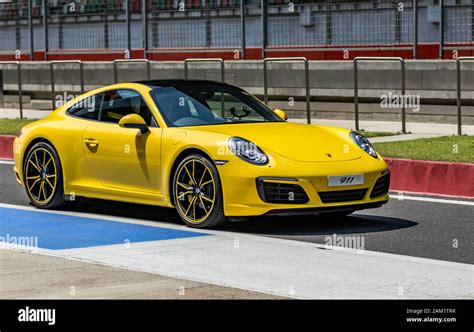Yellow Porsche 911 Carrera Stock Photo Alamy