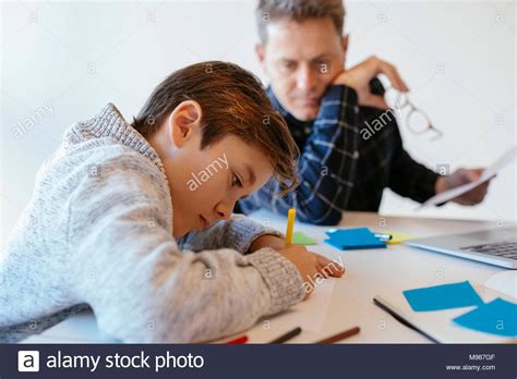 Man Sitting At Desk Drawing Hi Res Stock Photography And Images Alamy