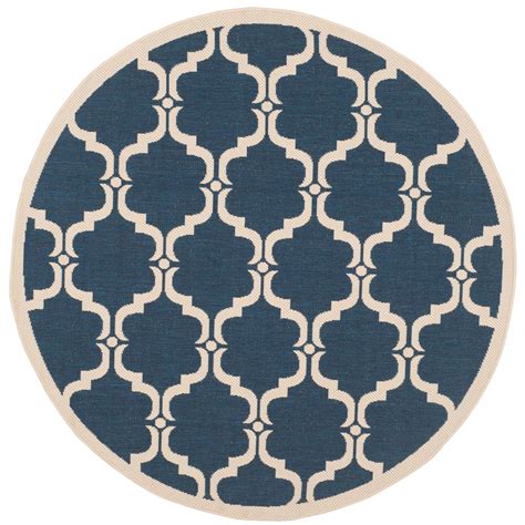 Discreetly abstract jewel toned round area rug: Safavieh Courtyard Navy/Beige 7 ft. x 7 ft. Indoor/Outdoor ...