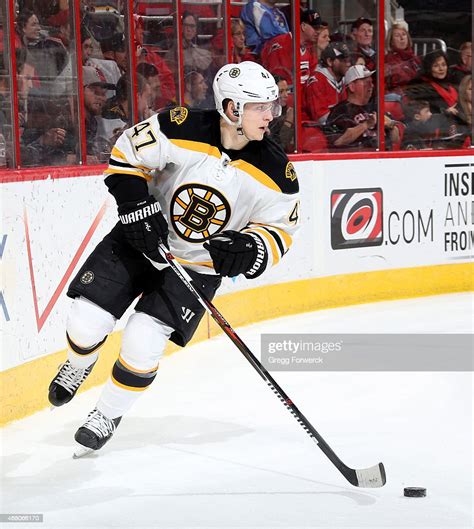 Torey Krug Of The Boston Bruins Carries The Puck During An Nhl Game