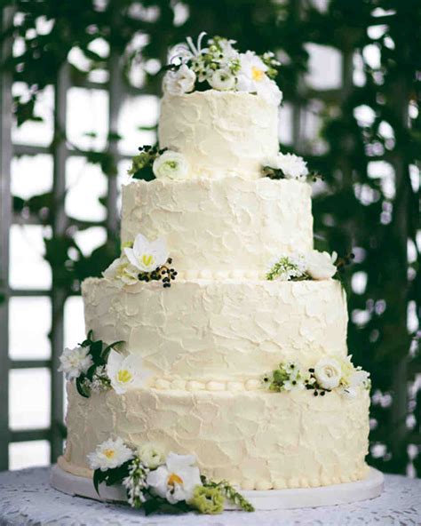 I made 2 cakes and frosted with a simple vanilla buttercream frosting. Buttercream Cakes from Real Weddings | Martha Stewart Weddings