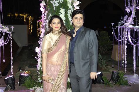 Sonali Bendre With Husband Goldie Behl At Wedding Sangeet Ceremony Of Riddhi Malhotra Rediff