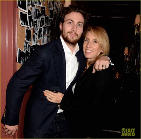 aaron taylor johnson cuddles close to his wife sam at the teen cancer america fundraiser photo
