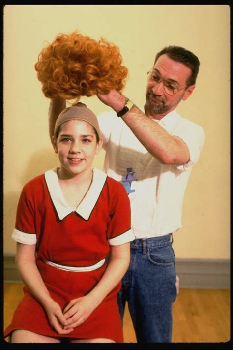 Actress Danielle Findley Being Fitted With Red Annie Wig In A