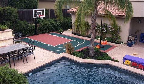This photo is one example of how the homeowner creates a basketball court and golf area. VersaCourt | Indoor, Outdoor & Backyard Basketball Courts ...