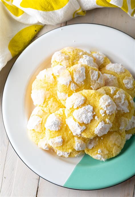 This year, swanky recipes has compiled a list of traditional holidays cookies. Lemon Crinkle Cookies Recipe #ASpicyPerspective #cookies # ...