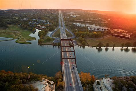 Aerial View Of Traffic On The Pennybacker 360 Bridge And Colorado River