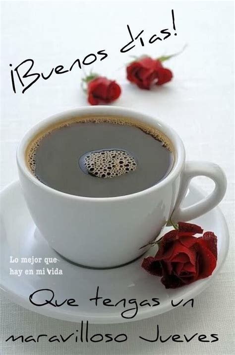 There Is A Cup Of Coffee On The Saucer With Roses In Front Of It