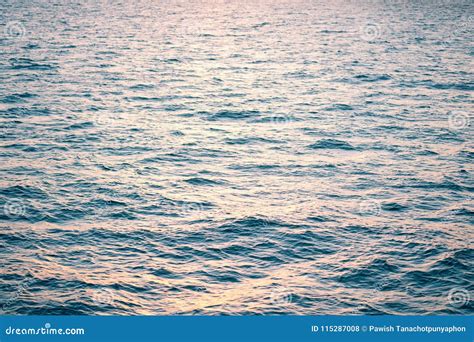 Calm Blue Sea Wave Surface Background Reflected With Evening Sun Stock
