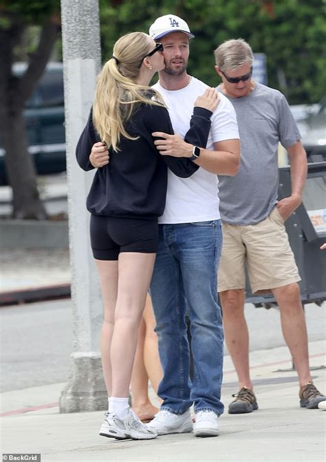 patrick schwarzenegger packs on the pda with his girlfriend abby champion while on a romantic