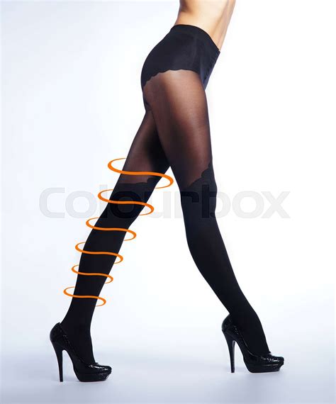 Beautiful Female Legs In Stockings On White Stock Image Colourbox