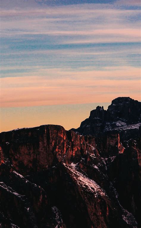 Download Wallpaper 950x1534 Shining Peaks Mountains Sunset Iphone