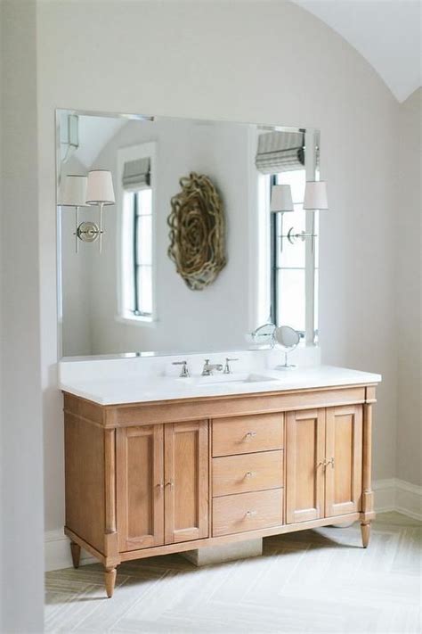 Amazing Bathroom Features A Honey Colored Washstand With A Full Length